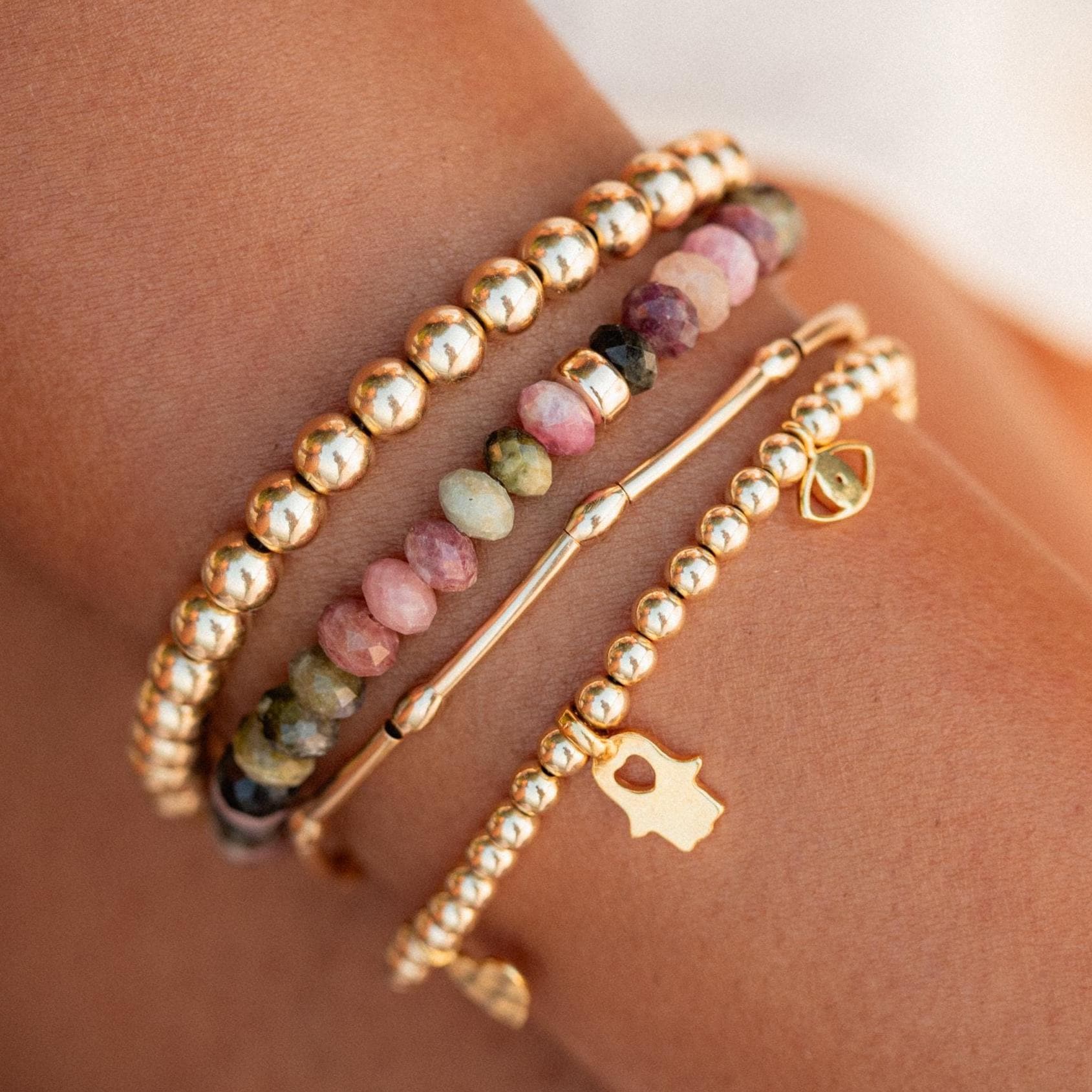Mixed tourmaline bracelet featuring colorful gemstone beads from Earthly Abundance, showcasing a vibrant, handcrafted jewelry piece.