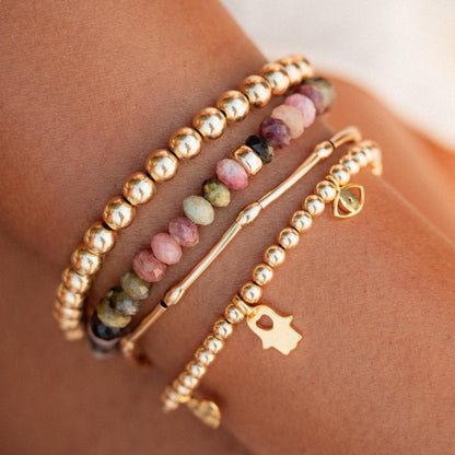 Mixed tourmaline bracelet featuring colorful gemstone beads from Earthly Abundance, showcasing a vibrant, handcrafted jewelry piece.