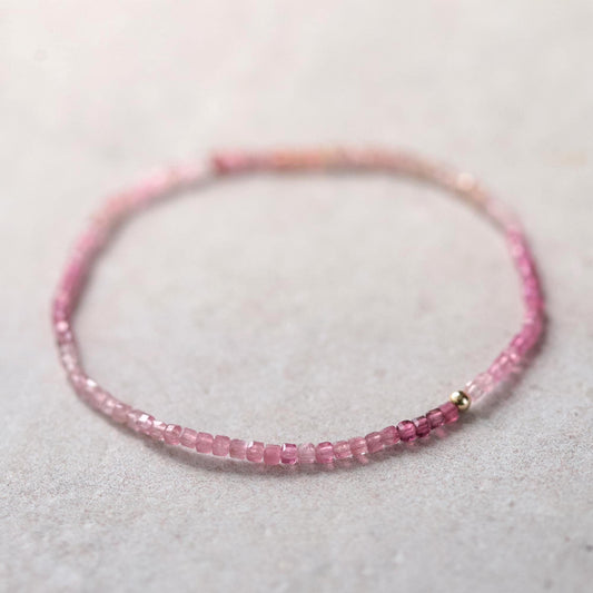 14K gold pink tourmaline cube bracelet by Earthly Abundance, featuring faceted gemstone beads and a delicate design