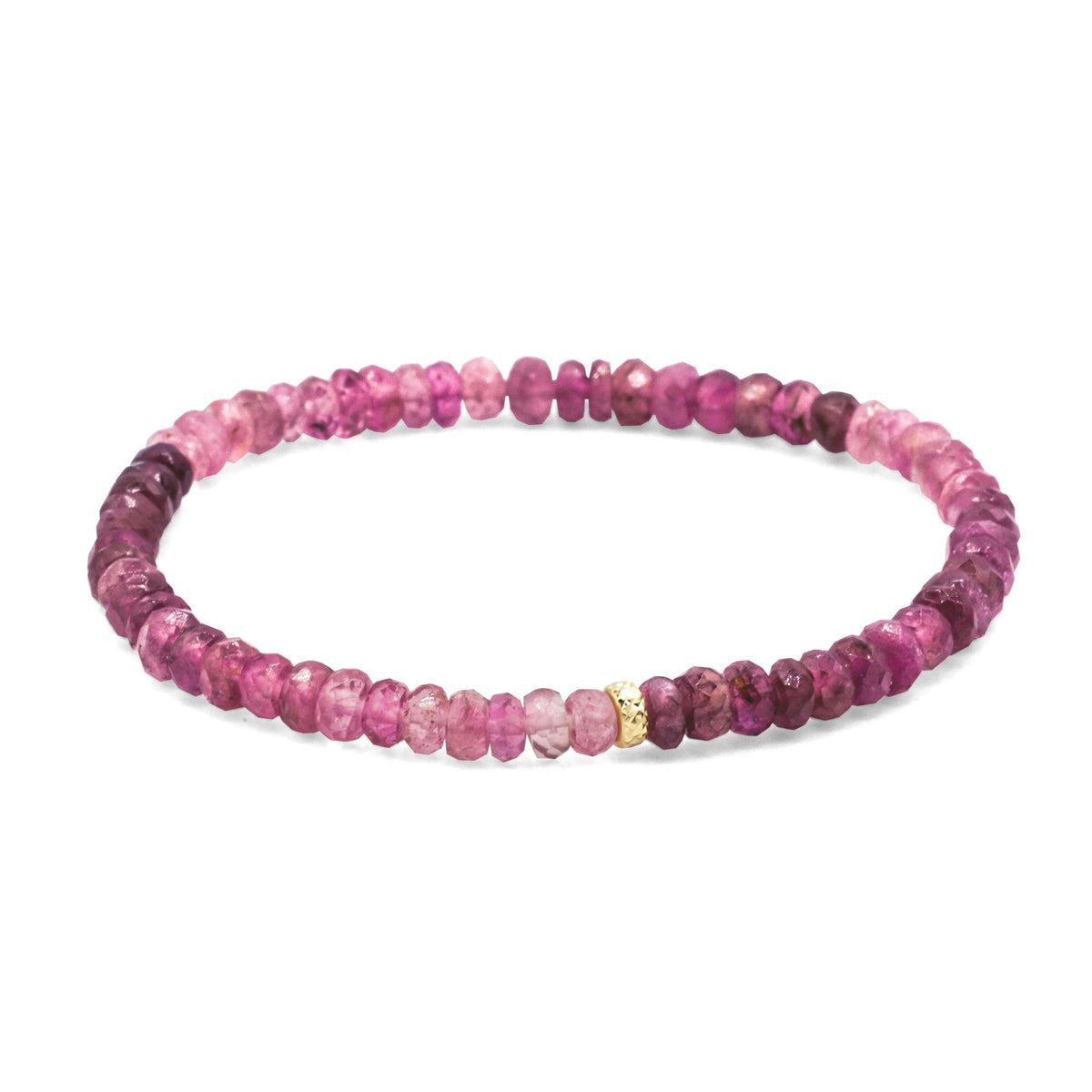 Open heart pink tourmaline bracelet with 14K gold setting from Earthly Abundance, featuring delicate pink gemstone accents.