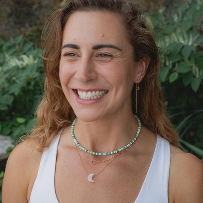 Peruvian opal necklace featuring vibrant, polished stones on a delicate chain, crafted by Earthly Abundance.
