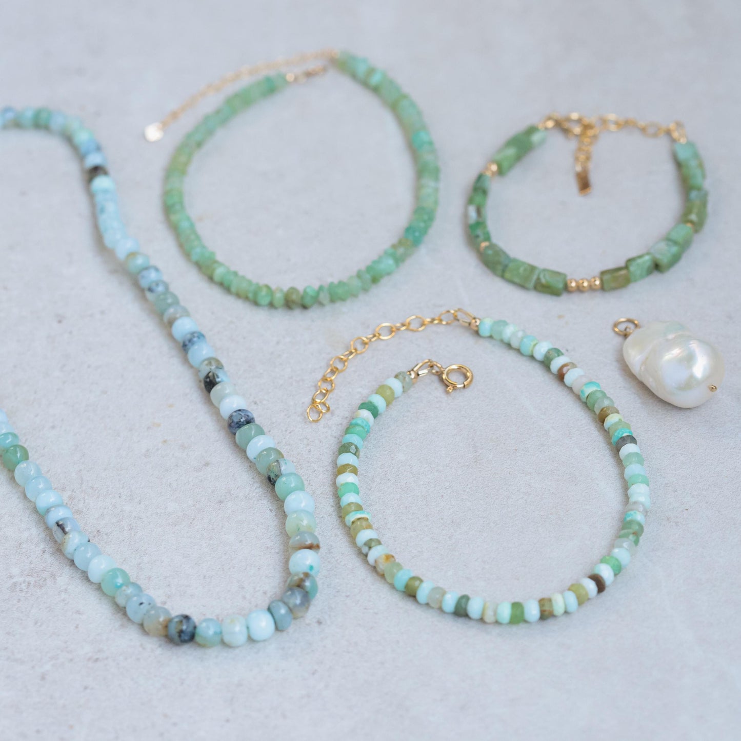Square cut Peruvian Opal anklet in 14K gold filled with delicate chain and clasp, featuring a polished opal stone.