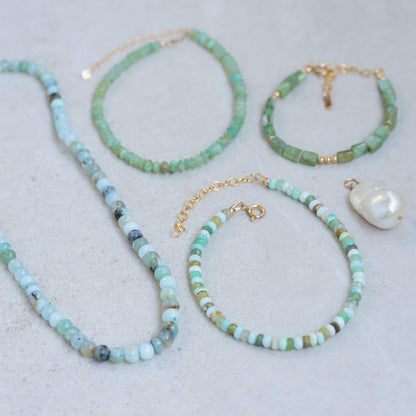 Square cut Peruvian Opal anklet in 14K gold filled with delicate chain and clasp, featuring a polished opal stone.