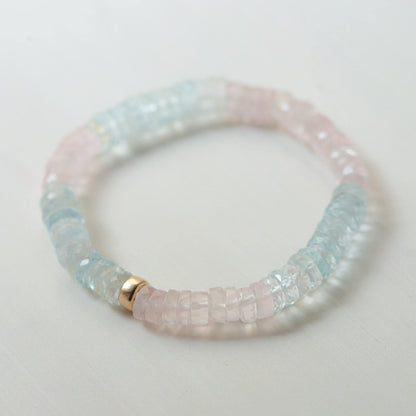 Pastel Morganite Beryl Heishi bracelet featuring soft pink and green beads, strung on a delicate cord, by Earthly Abundance.