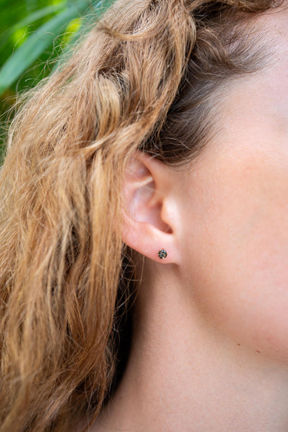 Smoky quartz stud earring by Earthly Abundance featuring a polished, faceted gemstone set in a silver-tone metal.