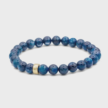 Kyanite bracelet featuring polished blue stones from Earthly Abundance Jewelry, displayed on a neutral background.