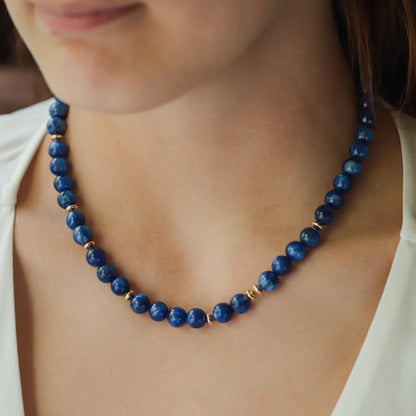 Kyanite energy necklace by Earthly Abundance featuring a polished blue kyanite pendant on a cord.