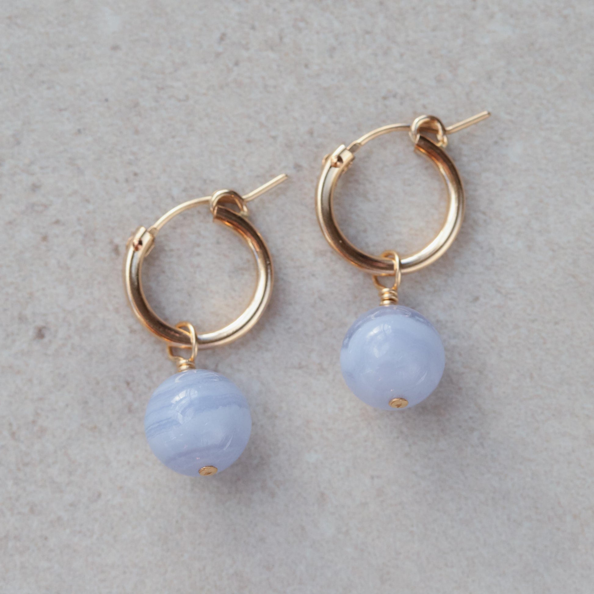 Blue Lace Agate hoop earrings with 14K gold-filled hoops, featuring polished blue gemstone beads and delicate gold accents.
