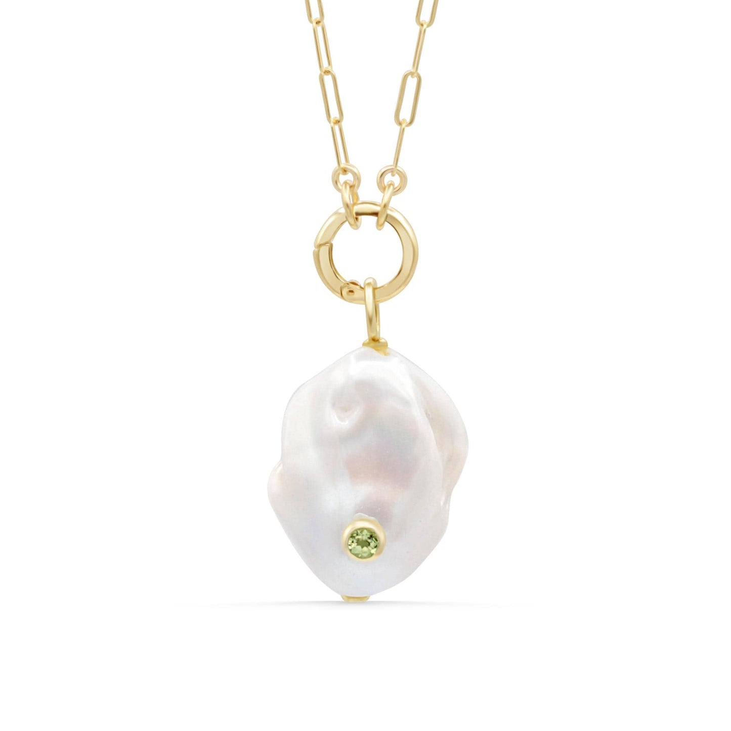 Lumen Baroque Pearl and Peridot necklace by Earthly Abundance featuring a string of irregular pearl and green peridot gemstones.
