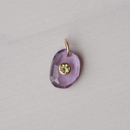 Wild Iris Pendant featuring Amethyst and Peridot gemstones by Earthly Abundance, showcasing a floral-inspired jewelry design.