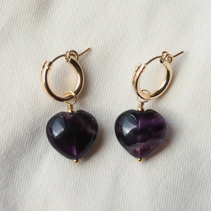 Earthly Abundance fluorite heart hoop earrings featuring vibrant purple and green fluorite stones on silver hoops
