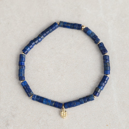 Lapis Lazuli mosaic bracelet by Earthly Abundance featuring vibrant blue stones and intricate beaded design.