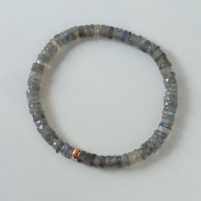Labradorite Moon Heishi bracelet by Earthly Abundance featuring round faceted labradorite beads on a stretch cord.
