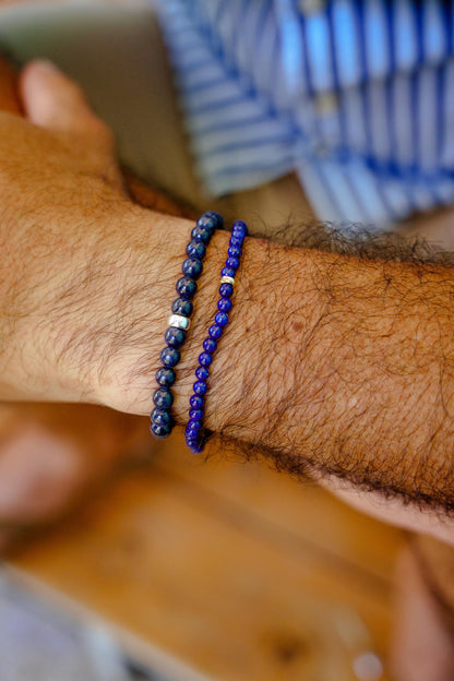 Lapis Lazuli bracelet with 14K gold accents from Earthly Abundance Jewelry, featuring deep blue stones and gold details.