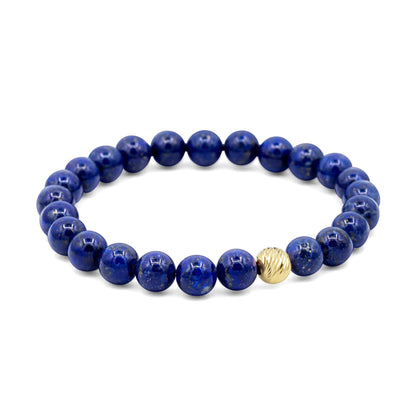 Lapis Lazuli bracelet with 14K gold accents from Earthly Abundance, featuring deep blue stones and gold clasp.