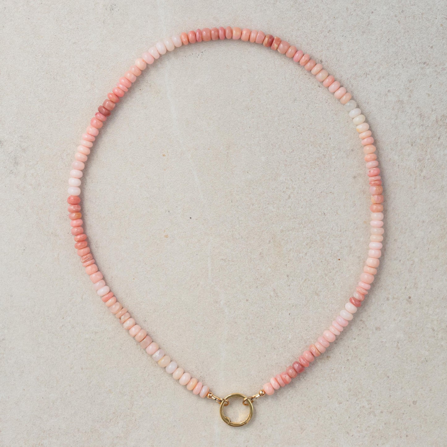Cotton Candy Pink Opal Necklace by Earthly Abundance featuring a vibrant pink opal pendant on a delicate chain.