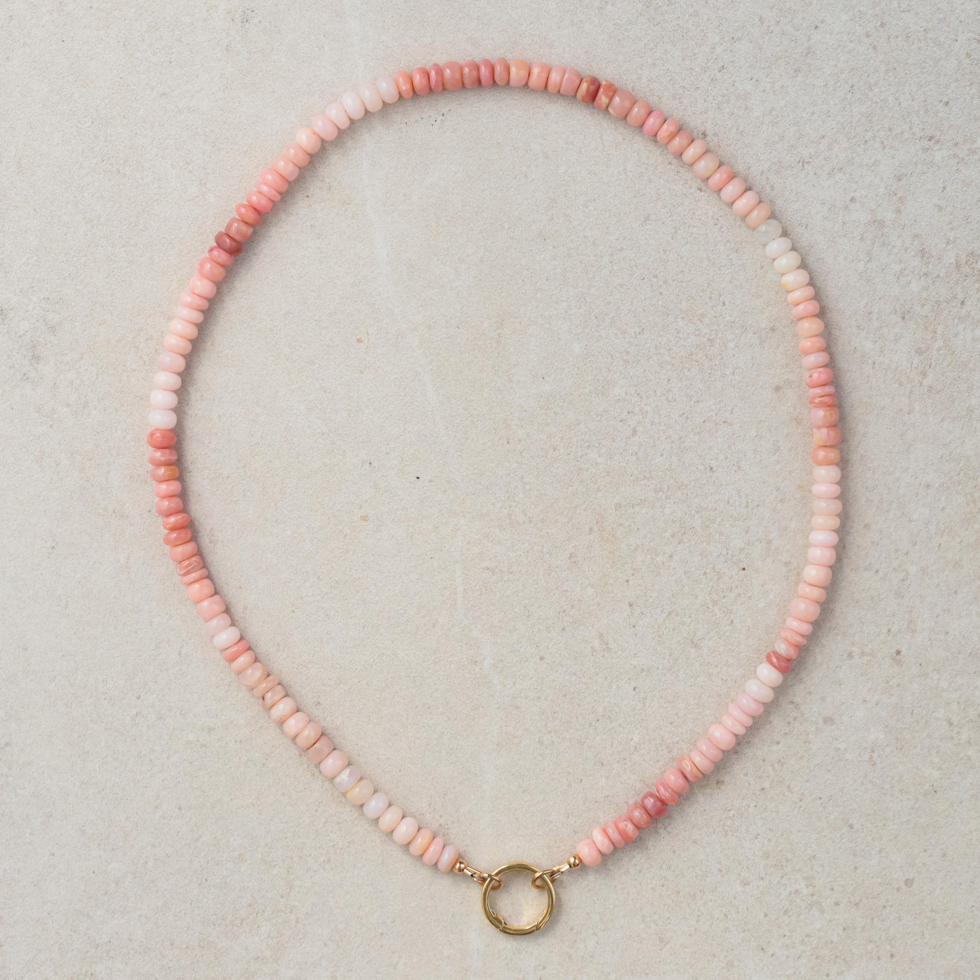 Cotton Candy Pink Opal Necklace by Earthly Abundance featuring a vibrant pink opal pendant on a delicate chain.
