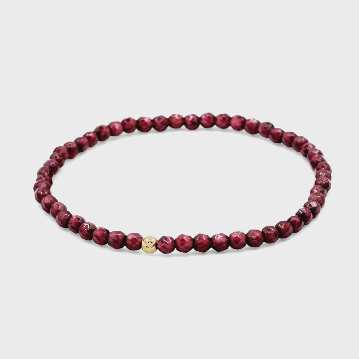 Mini faceted garnet bracelet with 3mm beads from Earthly Abundance, featuring a delicate, sparkling red gemstone design.