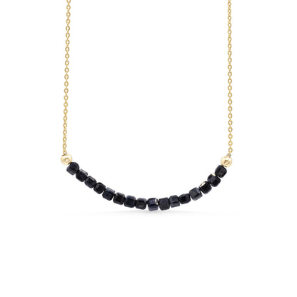 14K gold-filled Sapphire Line Necklace by Earthly Abundance featuring a delicate chain with sapphire accents.