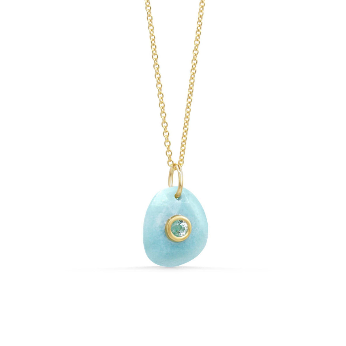 Ocean Light pendant necklace featuring Larimar and white topaz gemstones with silver chain from Earthly Abundance.
