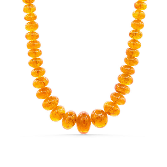 Spessartite Garnet necklace with 14K gold chain from Earthly Abundance, featuring vibrant orange-red gemstones on a delicate chain.