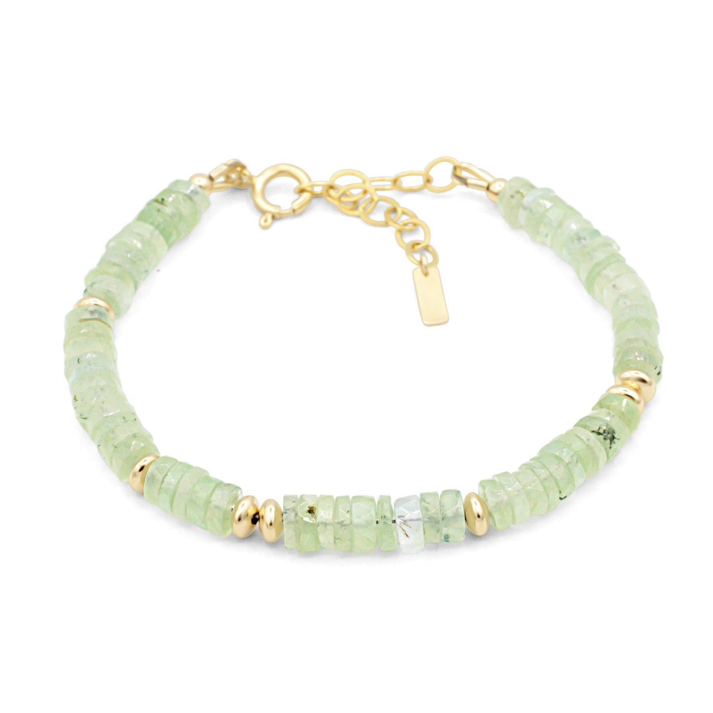 Prehnite glow bracelet featuring polished green stones from Earthly Abundance, showcasing smooth, rounded beads on an elastic band.