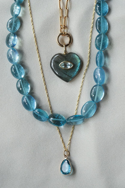 Bluewater Aquamarine Necklace featuring a stunning aquamarine pendant on a delicate chain by Earthly Abundance.