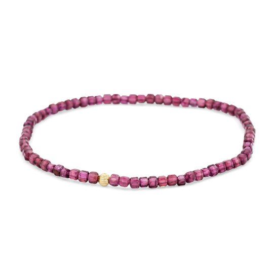 Earthly Abundance garnet cube bracelet in 14K gold featuring polished red gemstone cubes on a delicate chain.