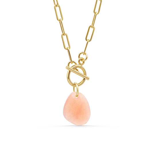 Peach moonstone toggle necklace by Earthly Abundance featuring a polished peach moonstone pendant on a toggle chain.