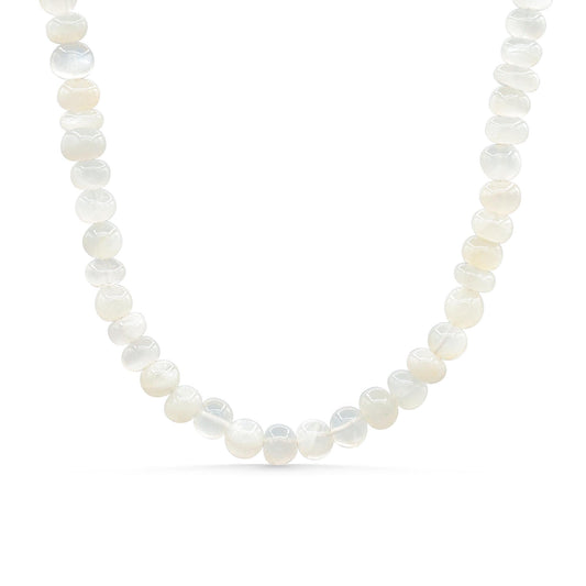 Ivory moon necklace by Earthly Abundance featuring a delicate pendant on a fine chain, styled for elegant, everyday wear.