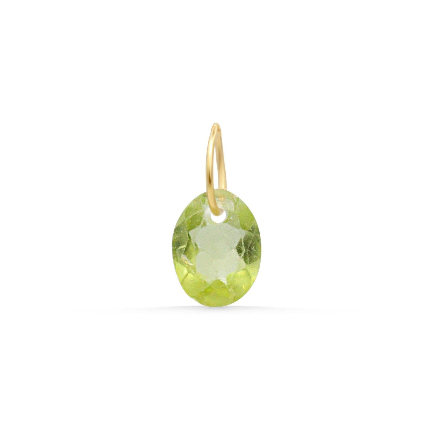 14K Peridot pendant necklace by Earthly Abundance featuring a vibrant green gemstone set in a delicate gold setting.