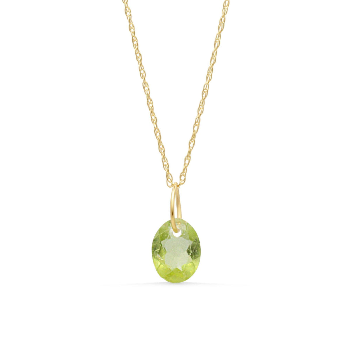 14K Peridot pendant necklace featuring a vibrant green gemstone on a delicate chain by Earthly Abundance