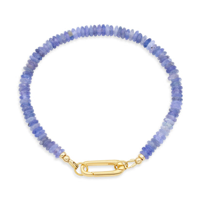 Merelani Tanzanite Carabiner Bracelet by Earthly Abundance featuring blue tanzanite stones on a silver clasp bracelet.