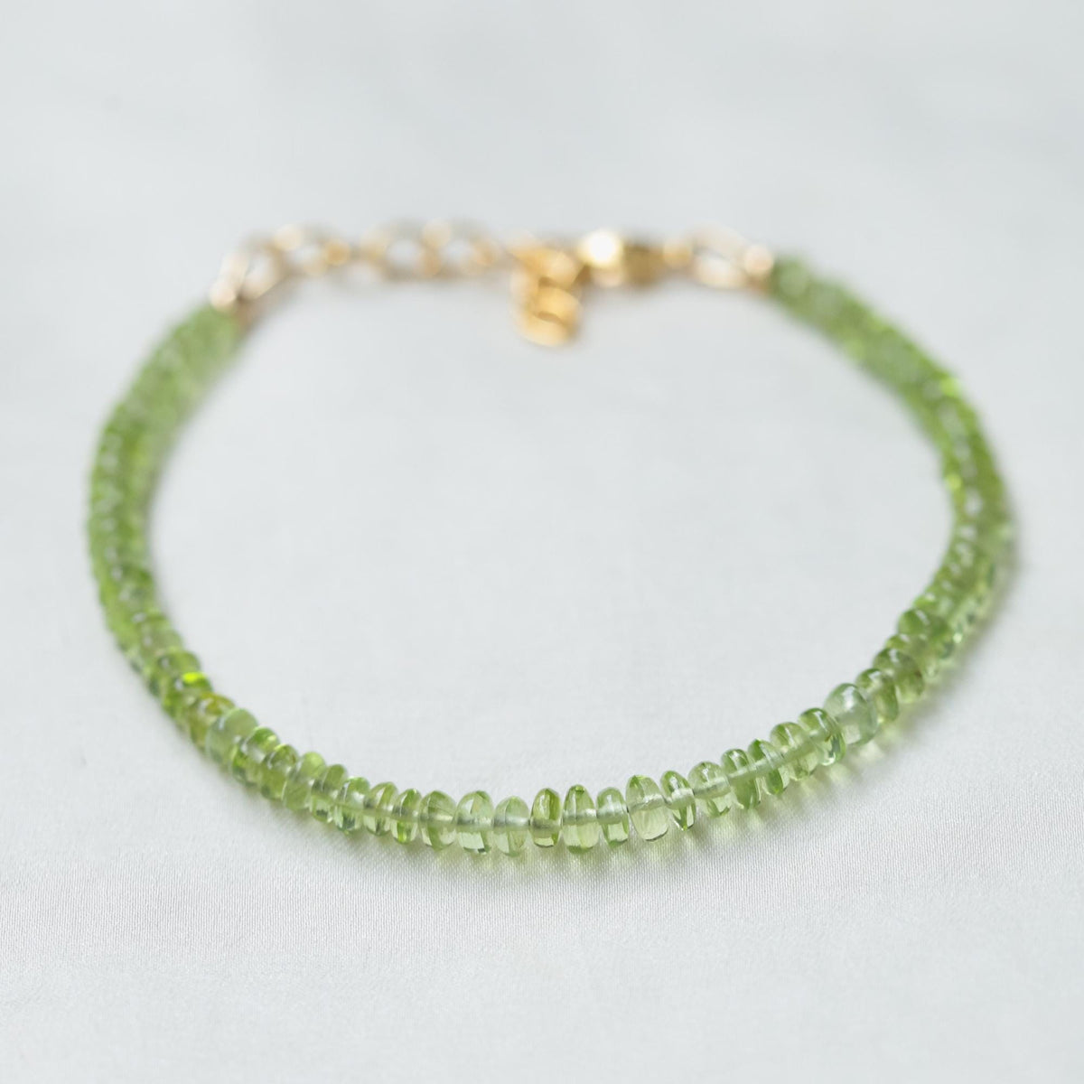 Smooth peridot rondel bracelet
