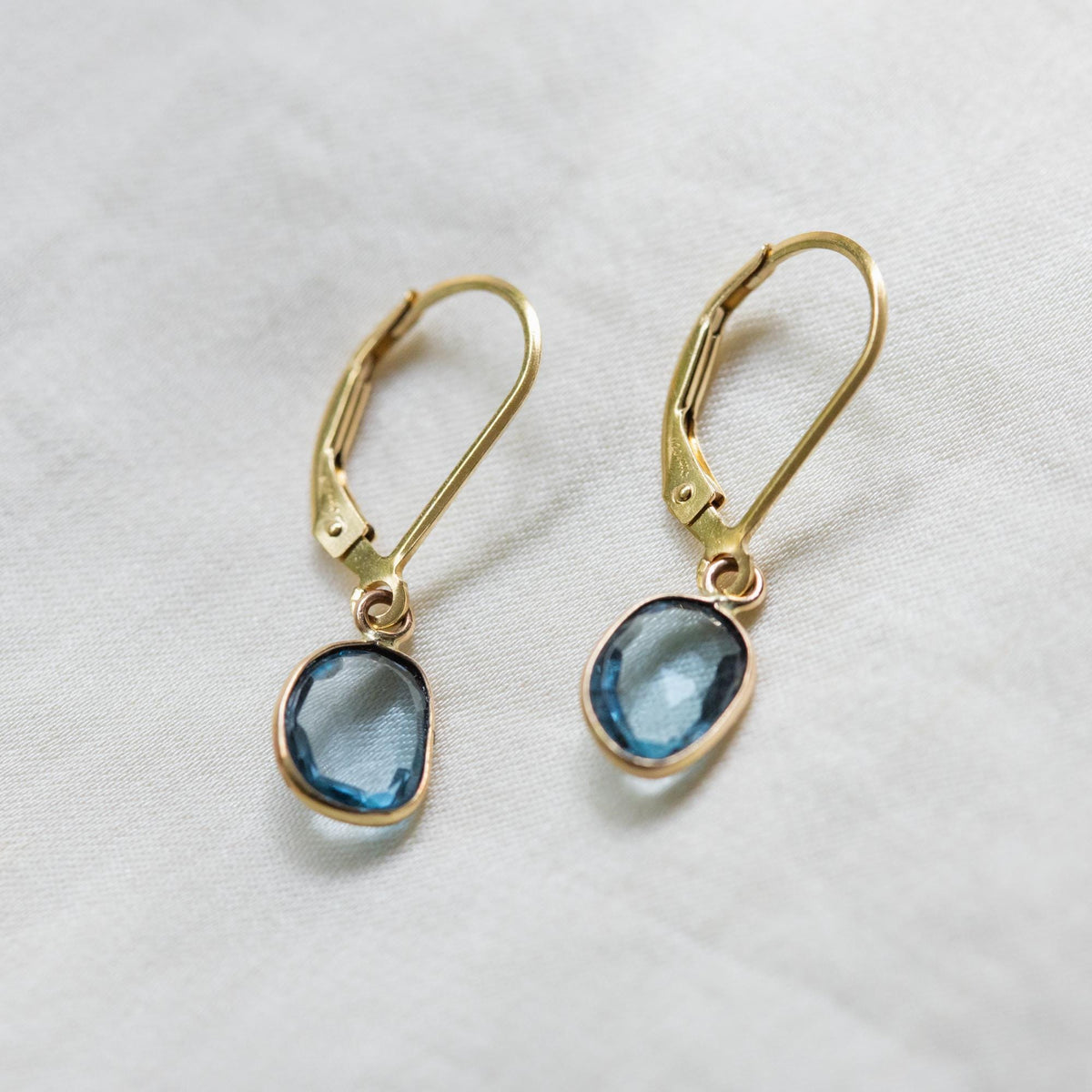 Swiss Blue Topaz Leverback Earrings – Brilliant Blue & Natural Radiance in Solid 14K Gold