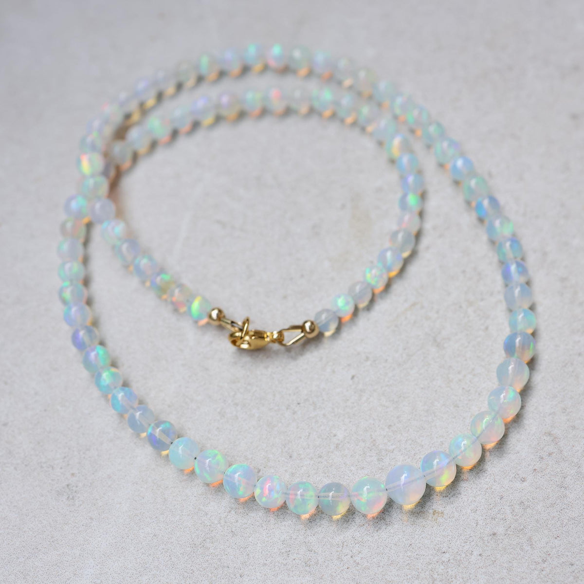 Smooth Ethiopian Opal Necklace – Gemmy Flash, Soft Fire