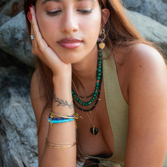 Elegant Midnight Muse Spinel Necklace by Earthly Abundance featuring a dark, sparkling spinel gemstone on a delicate chain.