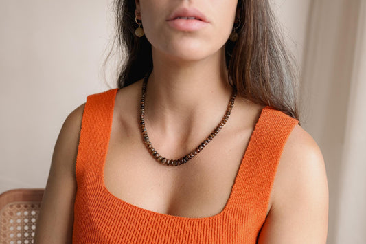 Copper Horizon Andalusite Necklace by Earthly Abundance featuring a copper chain and a vibrant Andalusite gemstone pendant.