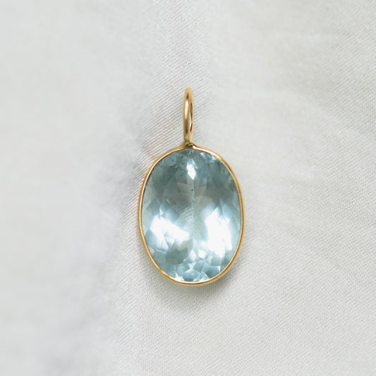 Aquamarine and solid 14K gold ocean-themed pendant by Earthly Abundance, featuring a serene aquamarine gemstone.