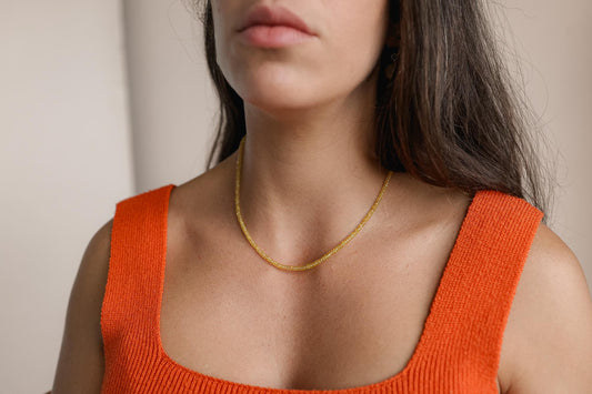 Yellow sapphire necklace in 14K gold featuring a vibrant yellow gemstone, elegant jewelry piece from Earthly Abundance.