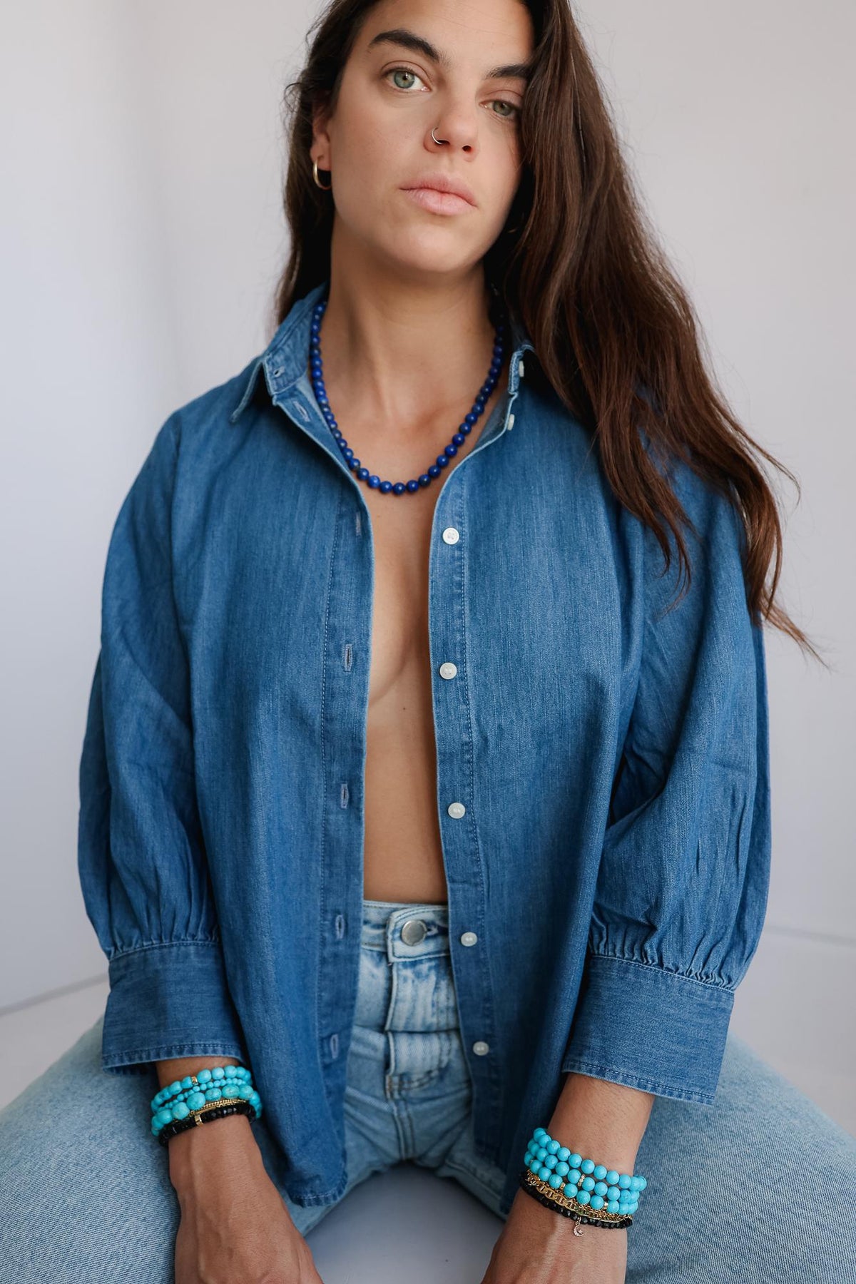 Royal Lapis Necklace featuring 10mm Lapis Lazuli beads from Earthly Abundance, showcasing vibrant blue gemstones on a delicate chain.
