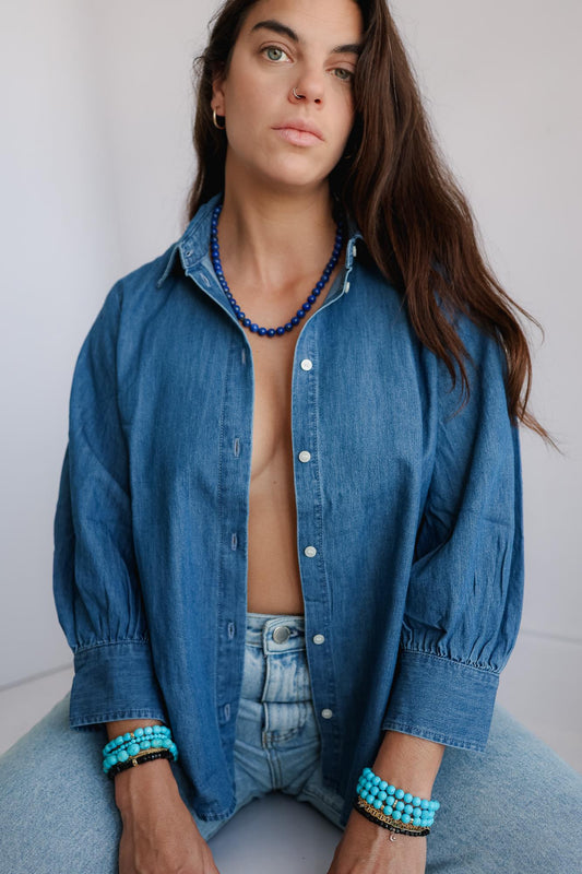 Royal Lapis Necklace featuring 10mm Lapis Lazuli beads from Earthly Abundance, showcasing vibrant blue gemstones on a delicate chain.