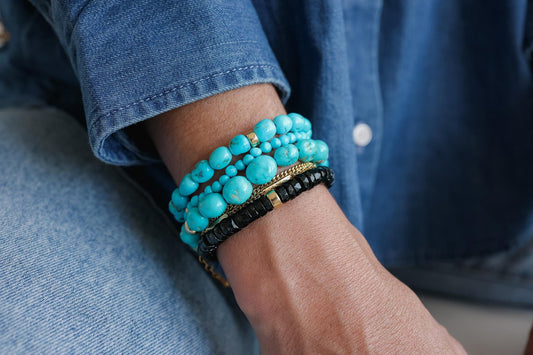 Black Tourmaline Heishi bracelet featuring small, polished black tourmaline beads on an elastic band, from Earthly Abundance.