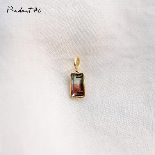 One of a Kind Bi-Color Tourmaline pendant from Earthly Abundance featuring a vibrant multi-tone gemstone on a silver chain