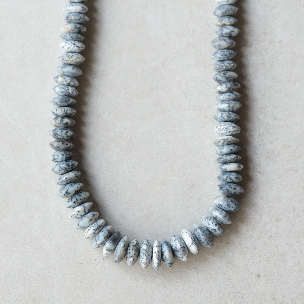 Dendritic Opal Necklace by Earthly Abundance featuring a polished dendritic opal pendant on a silver chain.
