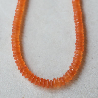 Earthly Abundance Tangerine Dream Carnelian Necklace featuring vibrant orange carnelian beads on a silver chain.