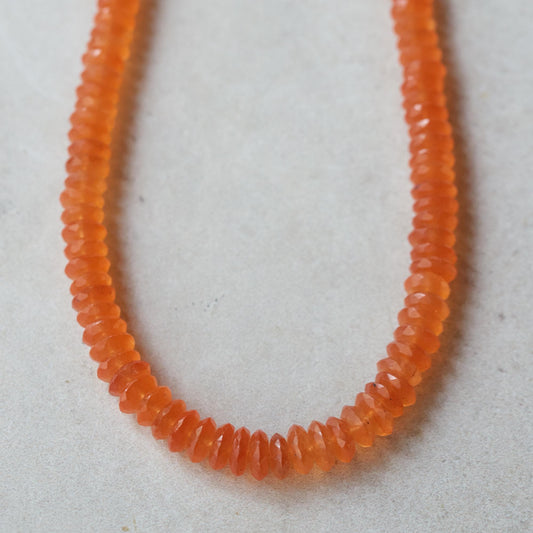 Earthly Abundance Tangerine Dream Carnelian Necklace featuring vibrant orange carnelian beads on a silver chain.