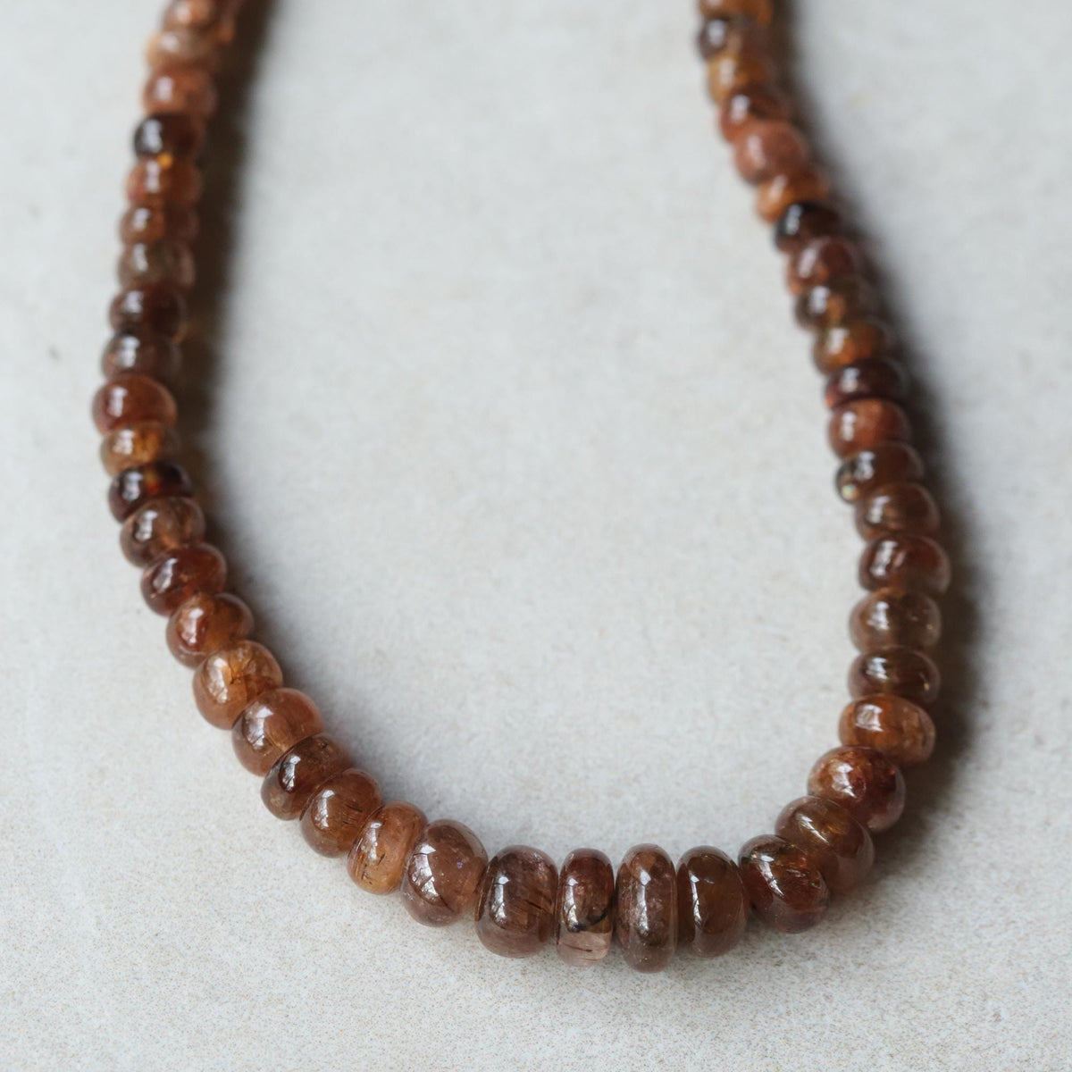 Copper Horizon Andalusite necklace featuring a striking Andalusite gemstone on a copper chain, crafted by Earthly Abundance.