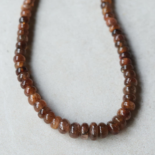 Copper Horizon Andalusite necklace featuring a striking Andalusite gemstone on a copper chain, crafted by Earthly Abundance.