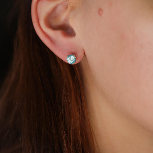 Gold filled gemstone earrings with 6mm stones from Earthly Abundance, featuring a close-up of the elegant dangle earrings.